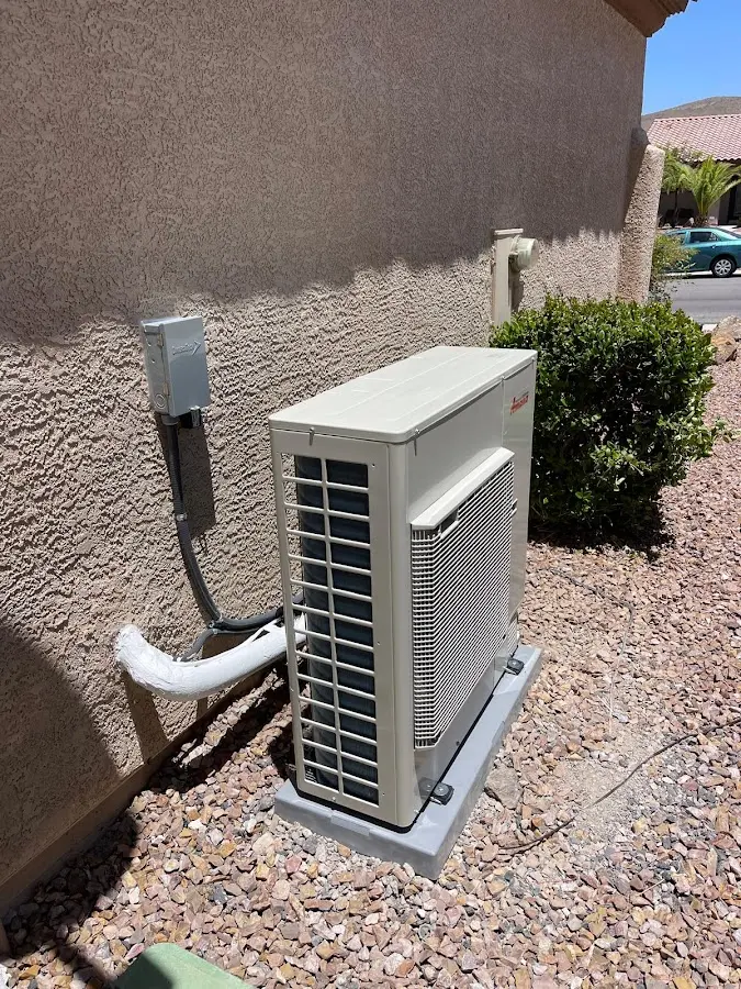 Residential air conditioning condenser unit in Vernon